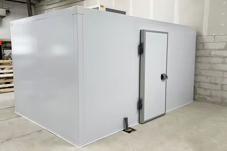 Insulated freezer room with heavy-duty door, built from cut-to-size panels